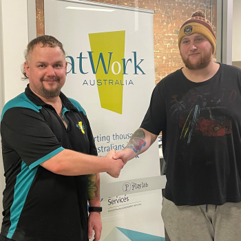 Job Coach Brad shakes hands with client Bruce from Victoria