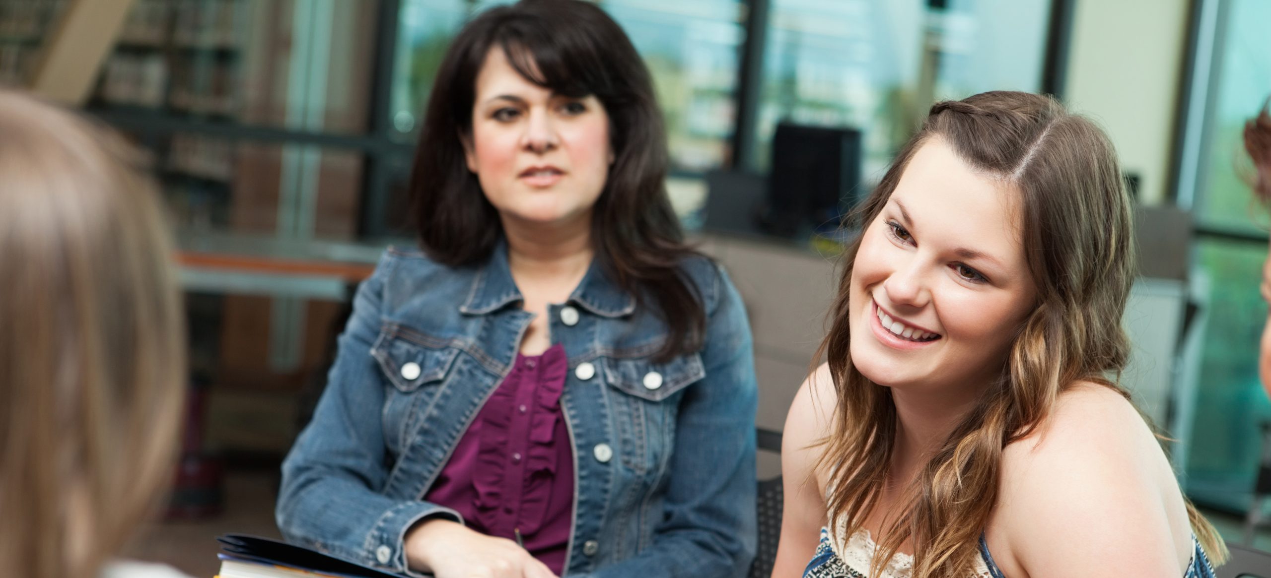 Teen girl talking during group counseling session