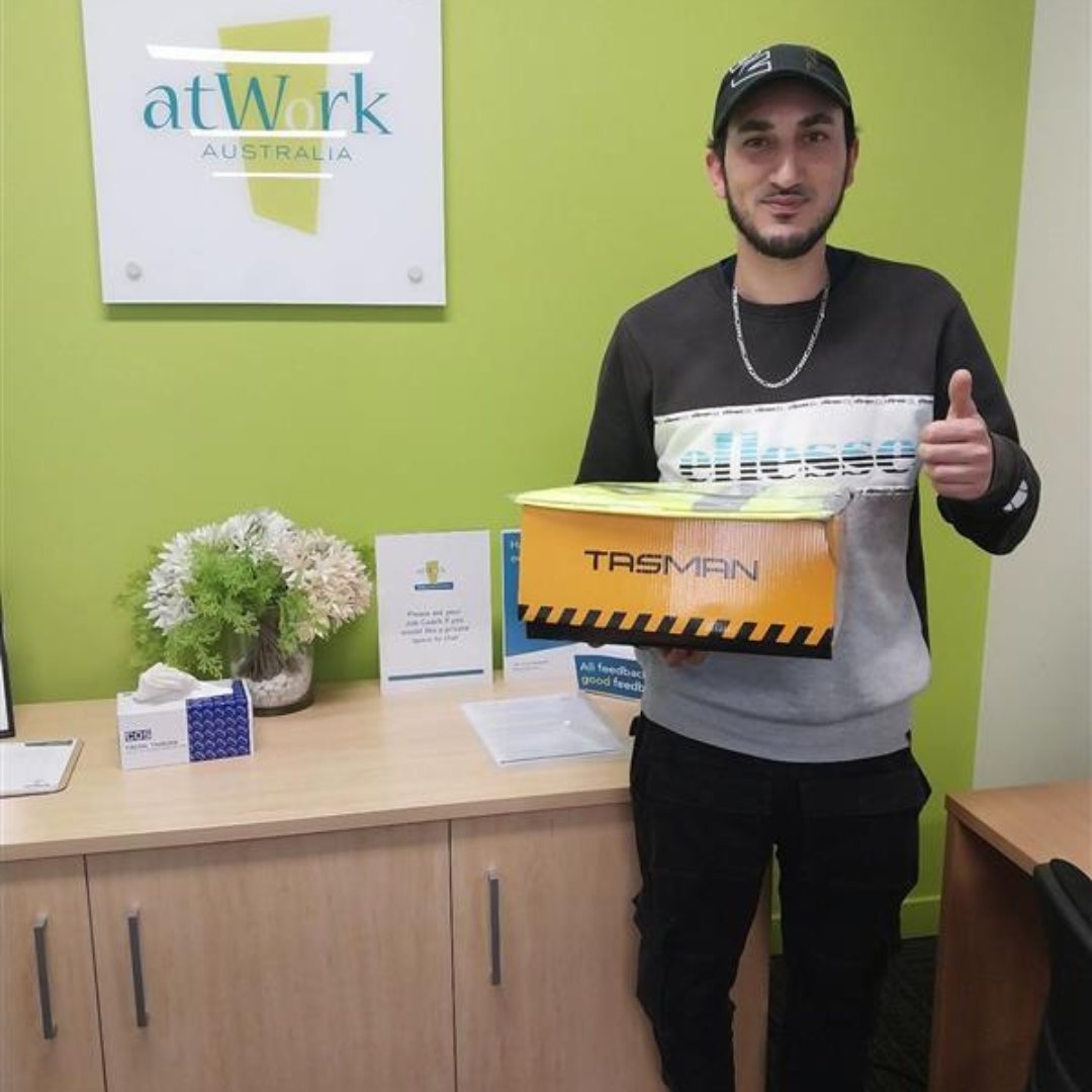 Job Coach, Alex, worked with Hussein at his pace during his employment journey